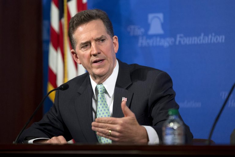 Jim DeMint, president of the Heritage Foundation, gestures during a news conference on immigration reform in May. (AP Photo/Evan Vucci)