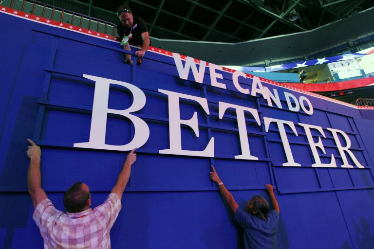 Workers place displays at the Republican National Convention inside of the Tampa Bay Times in Tampa, Fla., on Sunday, Aug. 26, 2012. (AP Photo/Lynne Sladky)