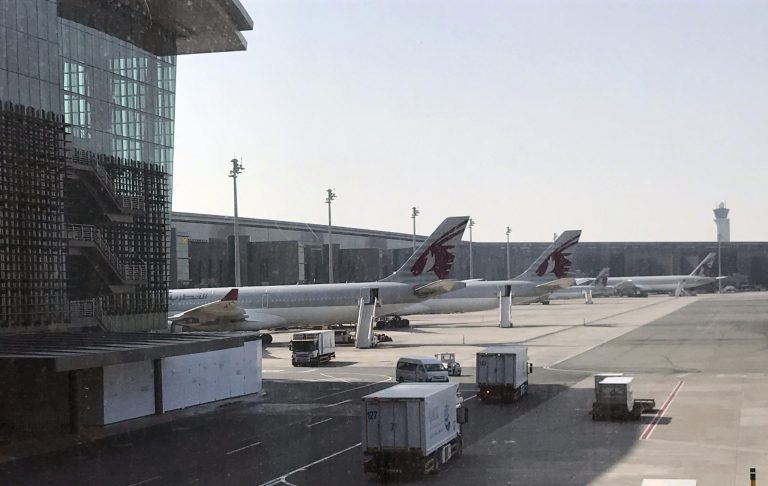 In this Friday, June 16, 2017 photo, Qatar Airways planes are seen parked at the Hamad International Airport in Doha, Qatar. The deadline for Qataris to leave neighboring Gulf Arab states has come into effect as the diplomatic standoff persists despite multiple mediation efforts. (AP Photo/Malak Harb)