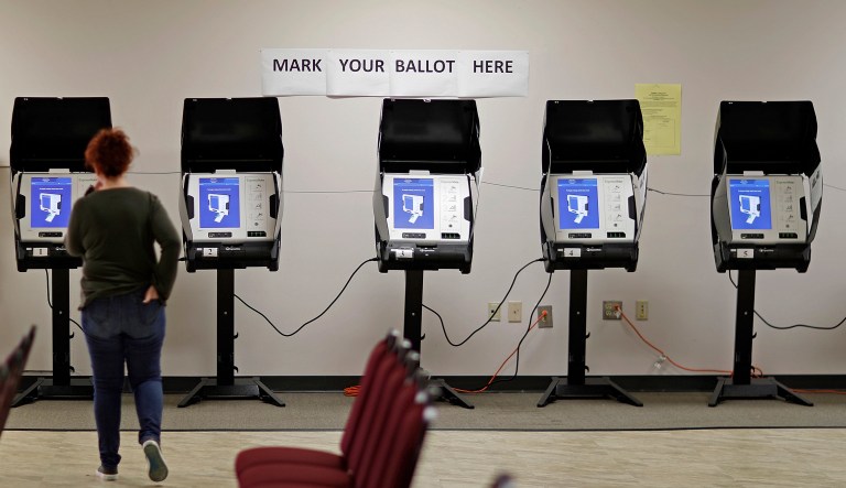 Two Democratic senators asked three companies, the largest vendors of election equipment, whether they shared source code or other sensitive information pertaining to voting machines with Russian entities. (AP Photo/David Goldman)