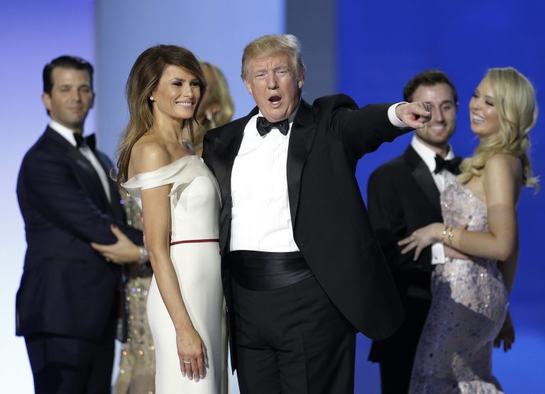 President Donald Trump acknowledges the crowd at the Freedom Ball in Washington, on Friday, Jan. 20, 2017, at the Washington Convention Center during the 58th presidential inauguration. (AP Photo/Mark Tenally)