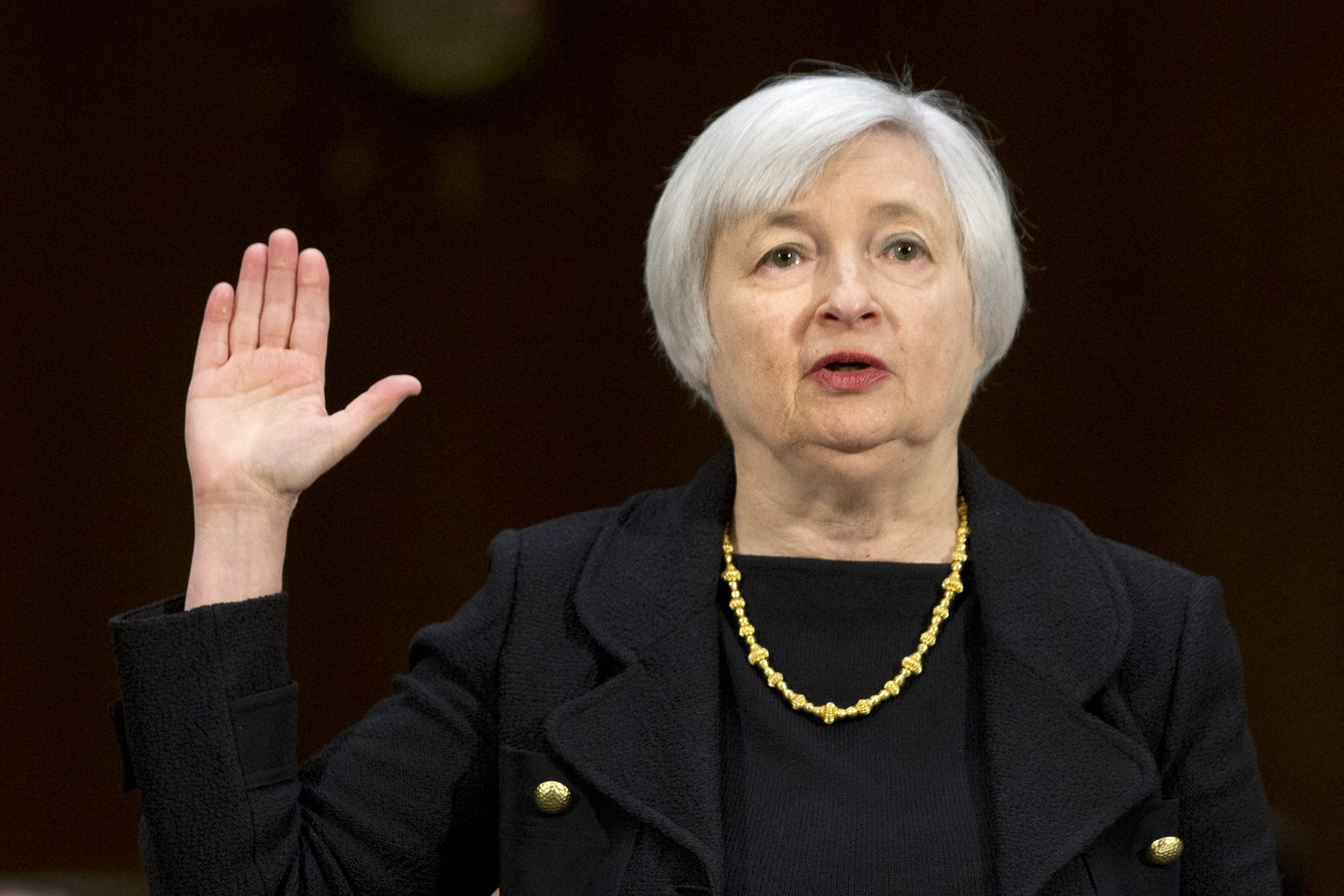Janet Yellen faces challenges as Fed trims bond buys