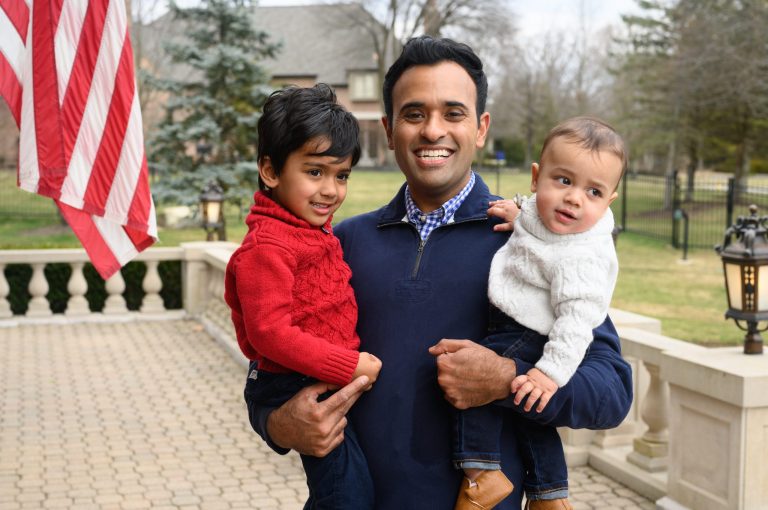 Vivek Ramaswamy holds his sons, Karthik and Arjun, at his home in Columbus, Ohio on Feb. 20, 2023.