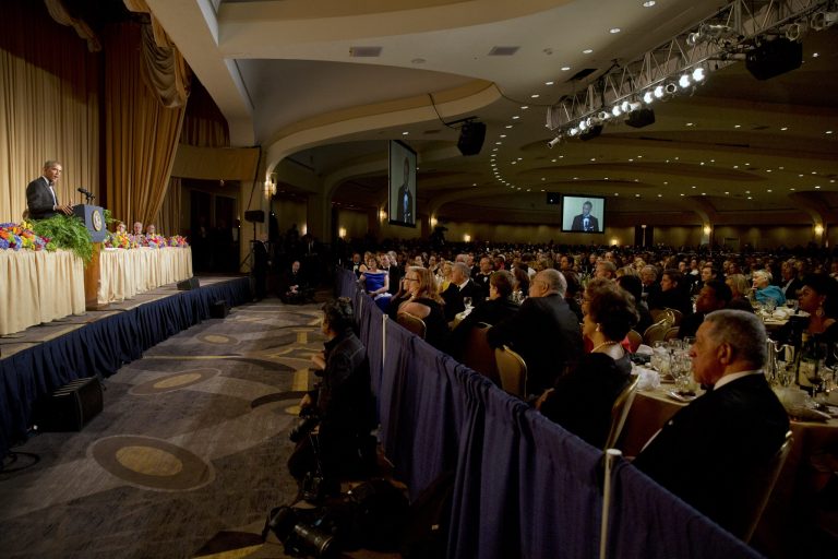 President Barack Obama, left, speaks during the White House Correspondents' Association Dinner in 2014. (AP Photo/Jacquelyn Martin)