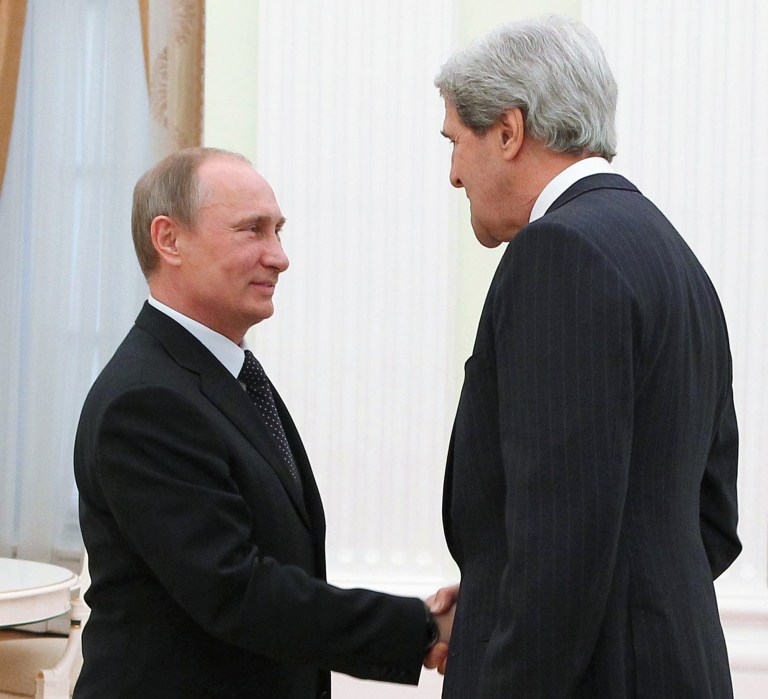 Russian President Vladimir Putin, left, and U.S. Secretary of State John Kerry shake hands during their meeting in the Kremlin in Moscow. Sharing classified data with Russia on missile defense capabilities will devalue the system's ability to function by giving a potential adversary information on how to defeat it. (AP Photo/RIA-Novosti, Mikhail Klimentyev, Presidential Press Service)
