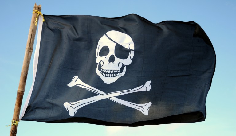 An intricate anti-Trump Halloween pirate ship display featuring the President as a 