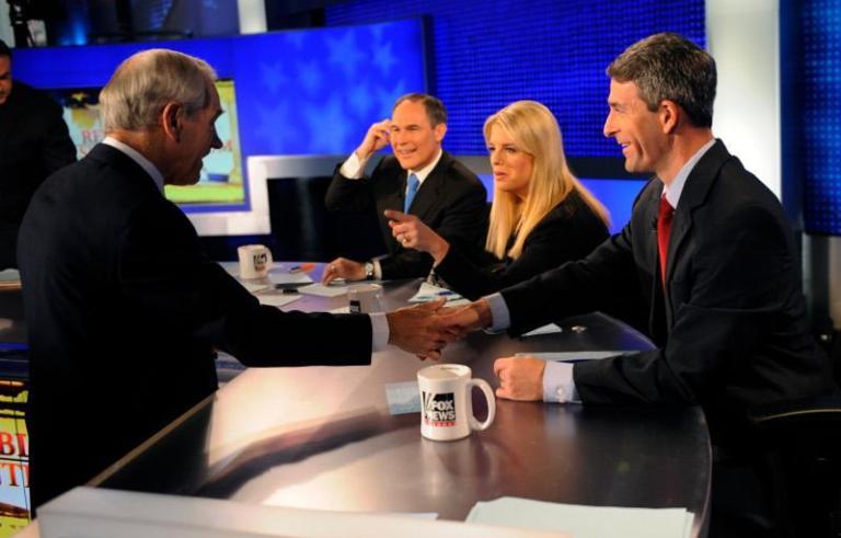 Republican presidential candidate Rep. Ron Paul, left, shakes hands with Virginia Attorney General Ken Cuccinelli, right, while talking to Florida Atty. Gen. Pam Bondi, second from right, and Oklahoma Atty. Gen. Scott Pruitt after appearing on the GOP Presidential Forum on 