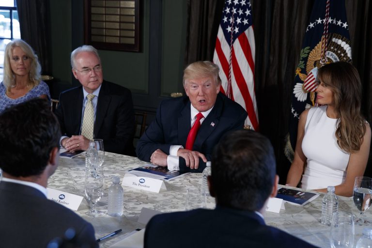 President Donald Trump speaks during a briefing on the opioid crisis, Tuesday, Aug. 8, 2017, at Trump National Golf Club in Bedminster, N.J. From left are, White House senior adviser Kellyanne Conway, Health and Human Services Secretary Tom Price, Trump, and first lady Melania Trump. (AP Photo/Evan Vucci)