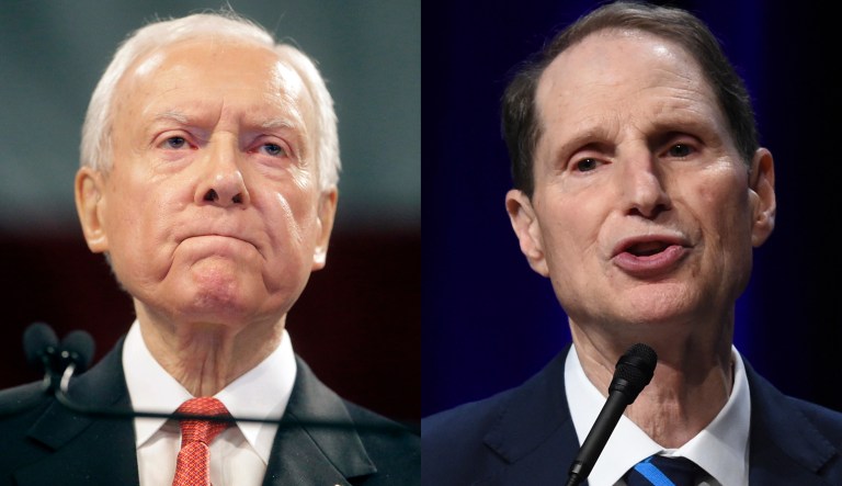 Sens. Orrin Hatch, R-Utah, and Ron Wyden, D-Ore., began a Senate Finance Committee hearing on Health and Human Services' 2018 budget by debating its impact on Medicaid. (AP Photos)