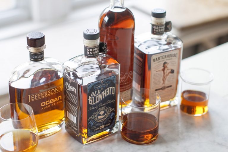 This Apr. 7, 2014 photo shows Jefferson's Ocean, Old Blowhard, Eagle Rare, and Barterhouse bourbons in Concord, N.H. All are part of a bourbon renaissance that has seen a new appreciation of American whiskey, as well as the birth of a whole new class of cult spirits. (AP Photo/Matthew Mead)