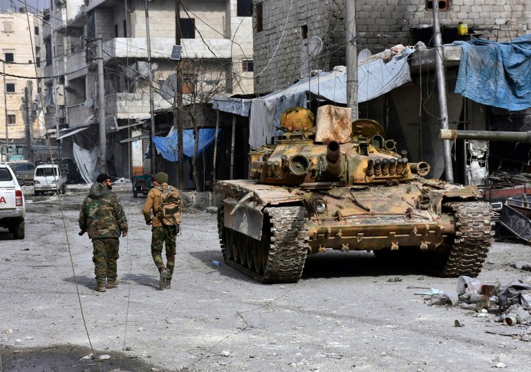 According to the United Nations, civilians were being shot in their homes by government forces. (SANA via AP)