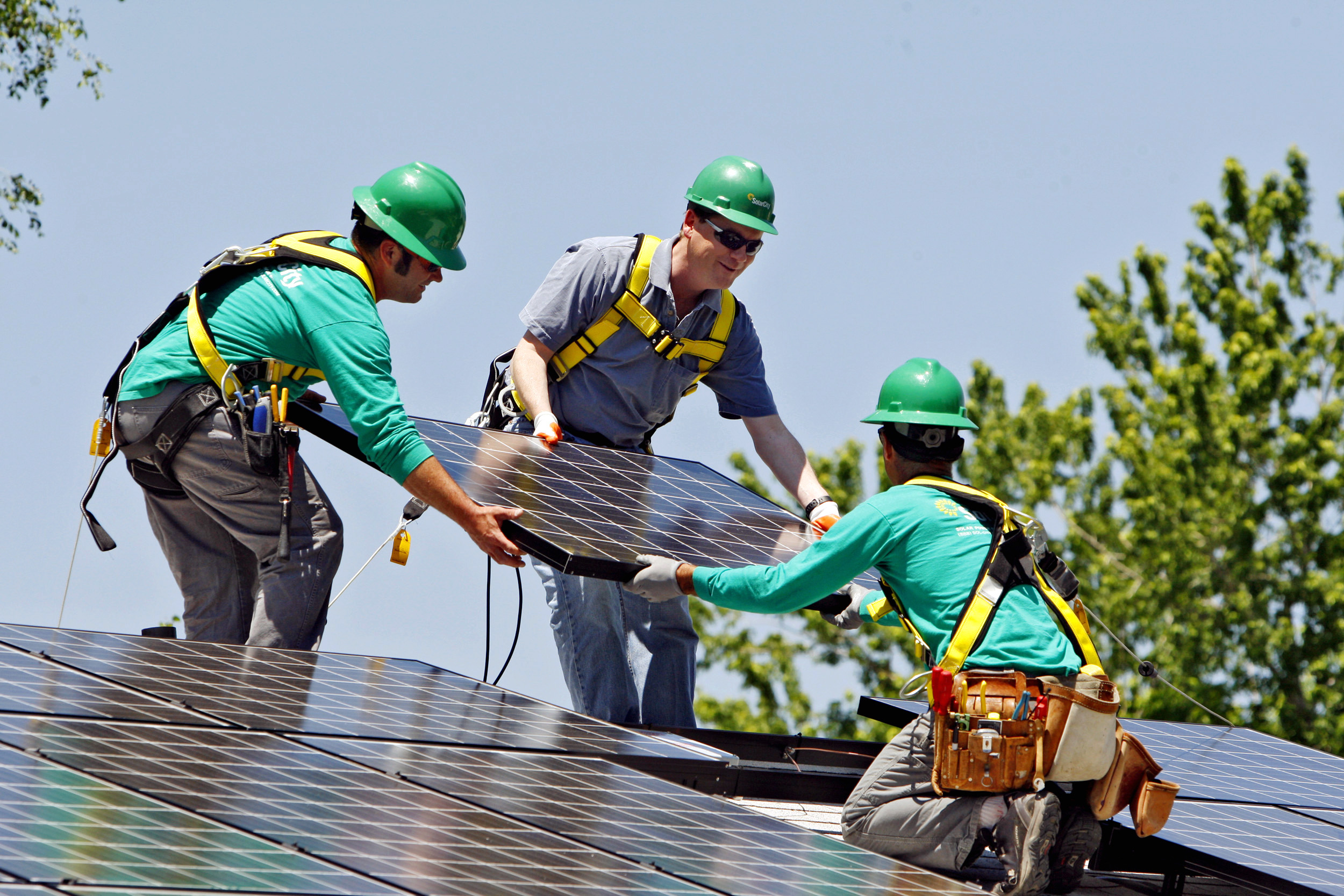 Elon Musk takes on carbon with solar, battery bets