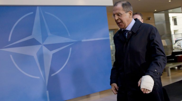   Russian Foreign Minister Sergey Lavrov is seen with a bandaged hand as he arrives for a meeting of NATO foreign ministers at NATO headquarters in Brussels on Tuesday, Dec. 4, 2012. NATO foreign ministers are expected to approve Turkey's request for Patriot anti-missile systems to bolster its defense against possible strikes from neighboring Syria. (AP Photo/Virginia Mayo)  