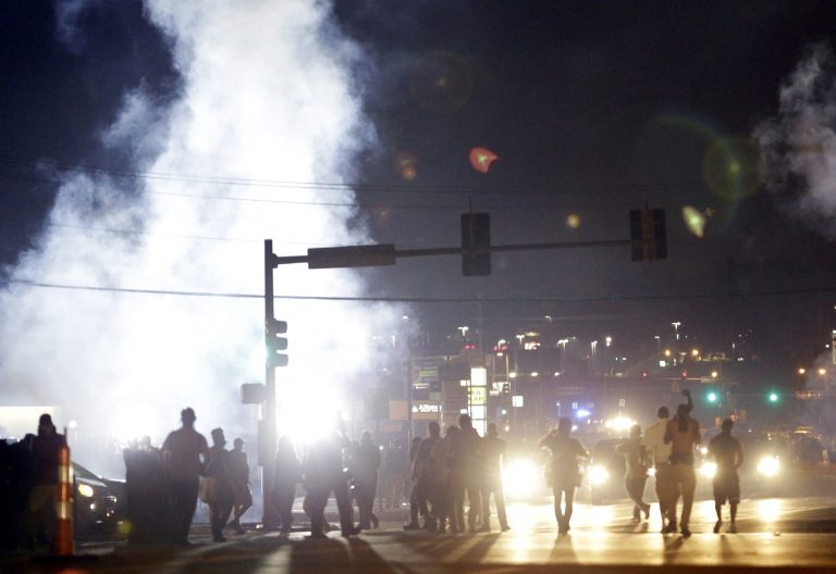 The U.S. government agreed to a police request to shut down several miles of airspace surrounding Ferguson, even though authorities said their purpose was to keep media helicopters away during protests in August, according to recordings of air traffic control conversations obtained by the Associated Press. (AP Photo/Jeff Roberson)