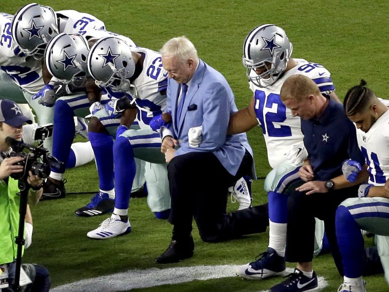 President Trump said the NFL was right to fine players for kneeling for the national anthem, as players for the Dallas Cowboys and many other teams did last year. (AP Photo/Matt York)