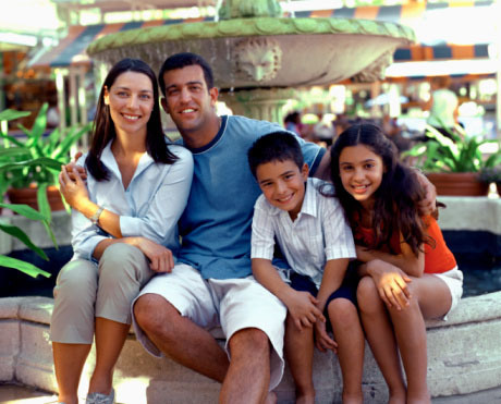Family by a fountain