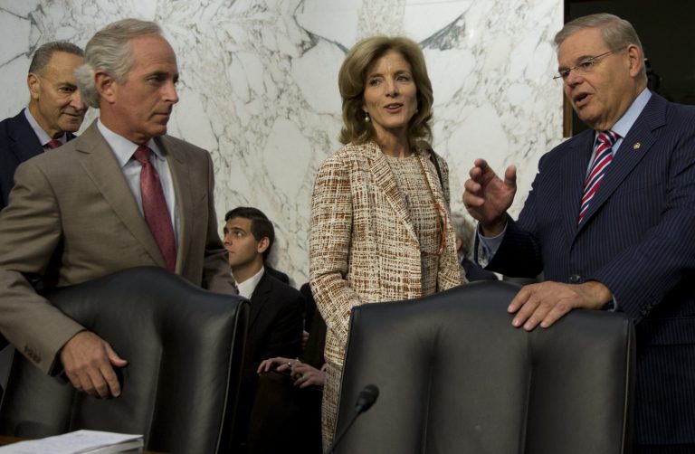 From left, Sen. Charles Schumer, D- N.Y., Ranking member Sen. Bob Corker, R-Tenn., Caroline Kennedy of New York and committee chairman Sen. Robert Menendez, D-N.J., arrive for the Senate Foreign Relations Committee nomination hearing on Kennedy to be Ambassador to Japan, on Capitol Hill on Thursday.(AP Photo/Carolyn Kaster)