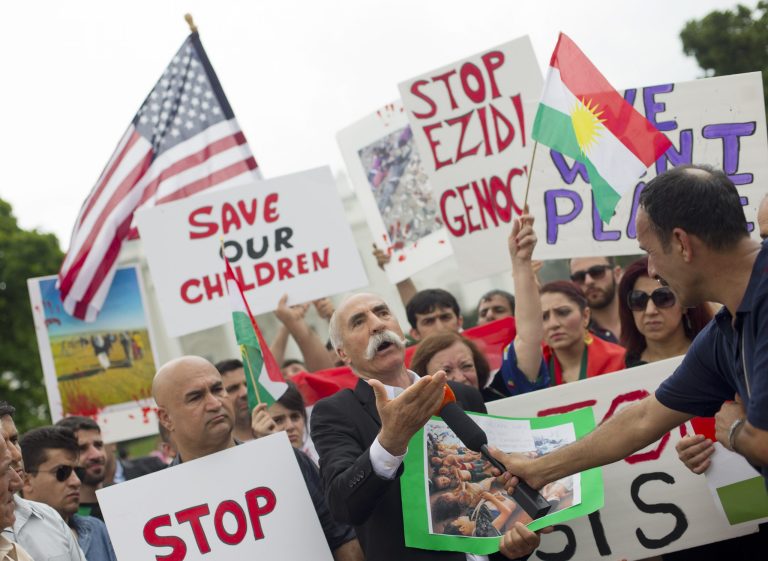 Kurdish demonstrators gather in front of the White House in Washington, Saturday, Aug. 9, 2014. For years, Kurdish officials have beseeched the Obama administration to let them buy U.S. weapons. For just as long, the administration has rebuffed America's closest allies in Iraq. (AP Photo/Pablo Martinez Monsivais)