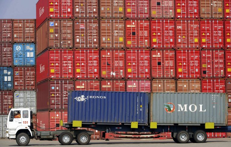 A truck driver moves containers in east China's Shandong province.  The world's second-largest economy added tariffs to U.S. imports last week, in a tit-for-tat retaliation to moves by the White House.