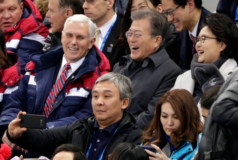 United States' Vice President Mike Pence and South Korean President Moon Jae-in laugh during the ladies' 500 meters short-track speedskating in the Gangneung Ice Arena at the 2018 Winter Olympics in Gangneung, South Korea, Saturday, Feb. 10, 2018. (AP Photo/Julie Jacobson)