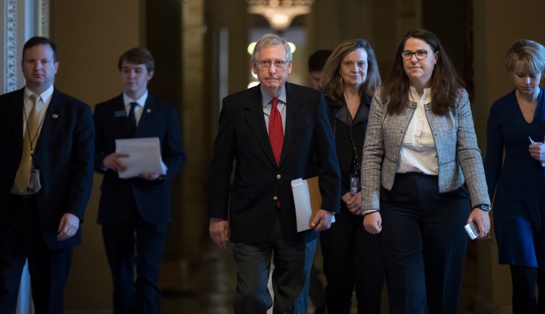 Sen. Jeff Flake, R-Ariz., claimed on Saturday that Senate Majority Leader Mitch McConnell, R-Ky., (pictured center) had promised to bring a DACA-related bill to the floor if a federal spending bill got done. McConnell's spokesman, David Popp, however, says that it is not true. (AP Photo/J. Scott Applewhite)