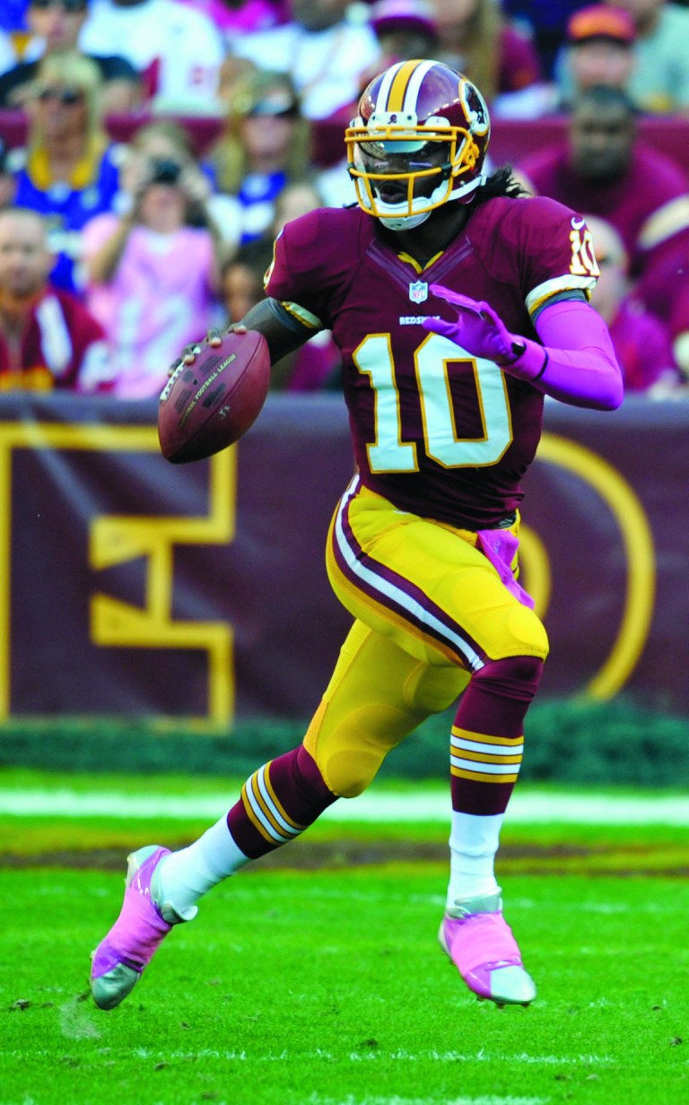 Cliff Owen/AP
Quarterback Robert Griffin III worked with Terry Shea to prepare for the NFL Draft.