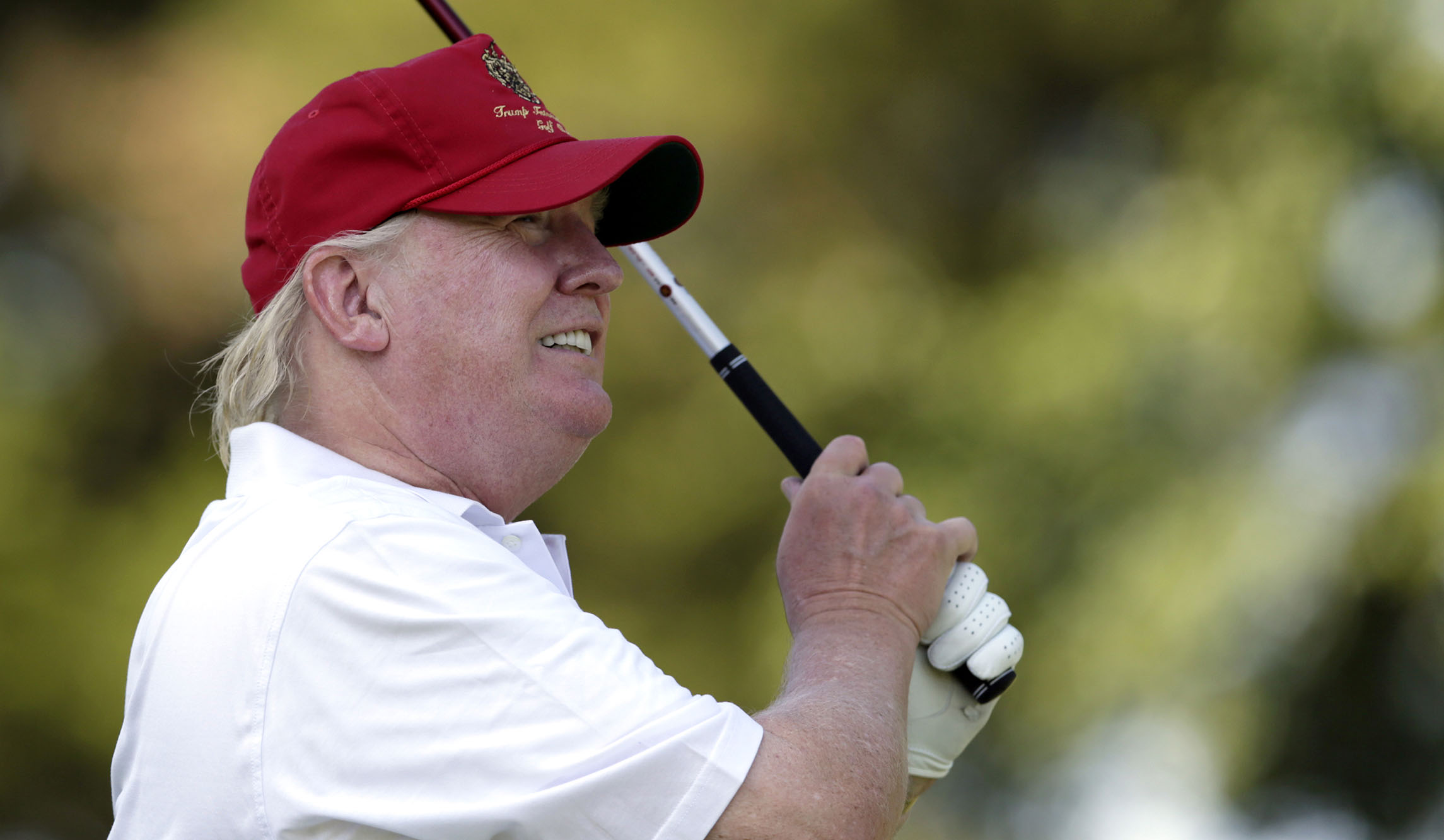 Trump retweets GIF of himself hitting Hillary Clinton with a golf ball