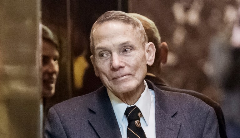 Physicist William Happer stands inside the elevator in the lobby of Trump Tower in New York.