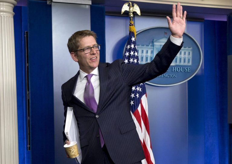 Outgoing White House press secretary Jay Carney waves following the conclusion of his final news briefing at the White House last month.(AP Photo/Jacquelyn Martin)