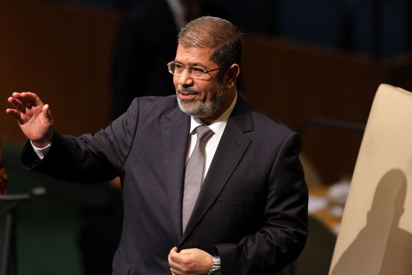 NEW YORK, NY - SEPTEMBER 26:  Egyptian President Mohammed Morsi walks to the podium for his address to world leaders at the United Nations General Assembly on September 26, 2012 in New York City. Over 120 prime ministers, presidents and monarchs are gathering this week at the U.N. for the annual meeting. This year's focus among leaders will be the ongoing fighting in Syria, which is beginning to threaten regional stability.  (Photo by Spencer Platt/Getty Images)