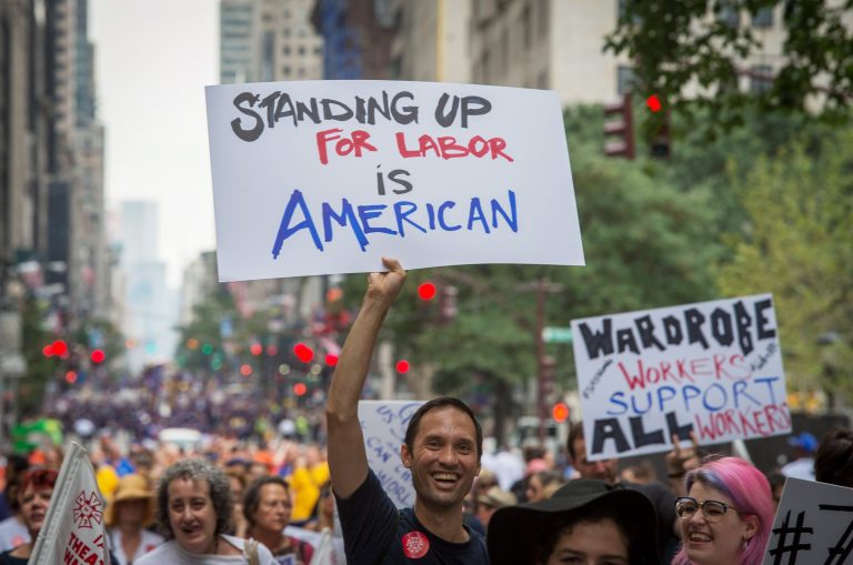 Union members marchÂ in the annual Labor Day Parade in New York, Saturday Sept. 12, 2015. In most states, workersÂ can still be forced to accept union representation.Â (AP Photo/Bryan R. Smith)