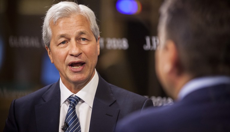 Jamie Dimon, chief executive officer of JPMorgan Chase & Co., speaks during a Bloomberg Television interview on the sidelines of the JP Morgan Global China Summit in Beijing, China, on Tuesday, May 8, 2018. Dimon signaled that he's hopeful mounting trade tensions won't derail the U.S. bank's plans to create a wholly owned securities venture in China.
