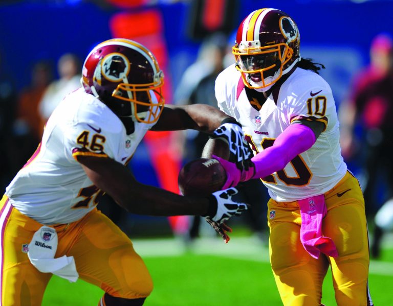 Bill Kostroun/AP
Behind rookie quarterback Robert Griffin III, the Redskins rank sixth in the NFL in total yards and seventh in the league in scoring.