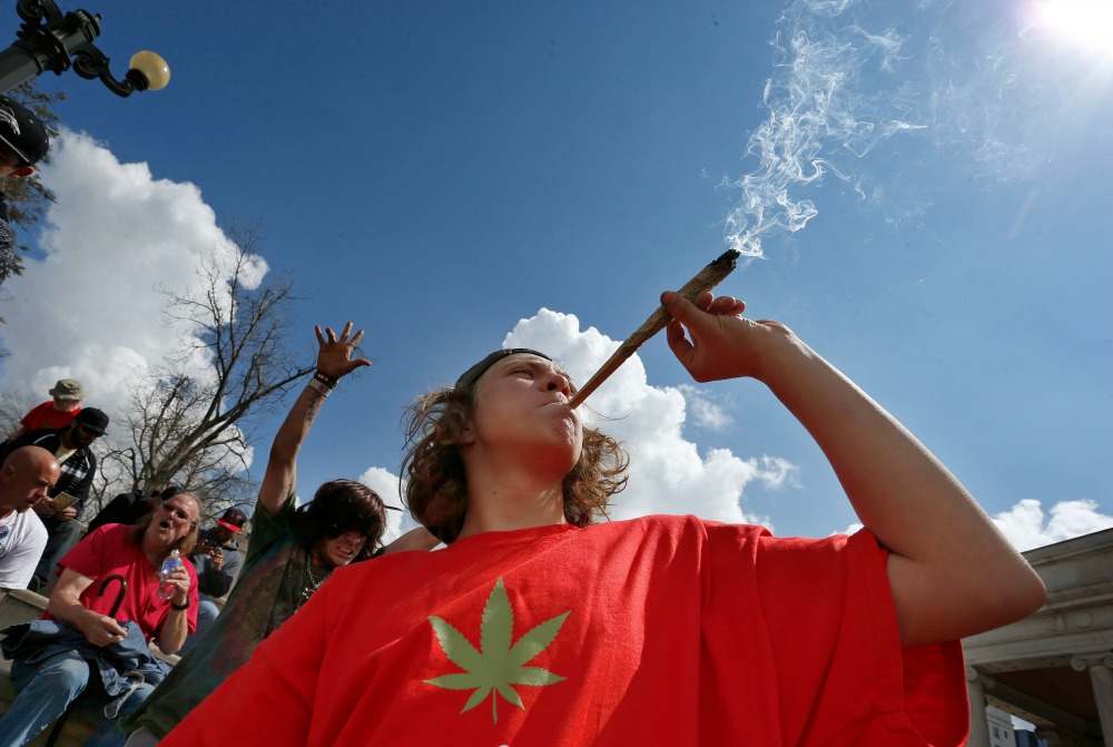 Pot activists get blunt with Obama