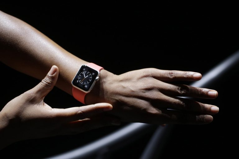 The new Apple Watch is shown by a model on a treadmill during a new product release on Tuesday, Sept. 9, 2014, in Cupertino, Calif. (AP Photo/Marcio Jose Sanchez)