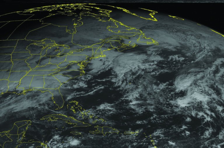 This NOAA satellite image taken Tuesday, December 25, 2012 at 10:45 AM EST shows a low pressure system over the Southern Plains and Lower Mississippi Valley moving into the Southeast with rain and thunderstorms. Snow and snow showers over the Central Plains and Mid Mississippi Valley. Farther north, snow showers are seen over northern New England. (AP PHOTO/WEATHER UNDERGROUND)