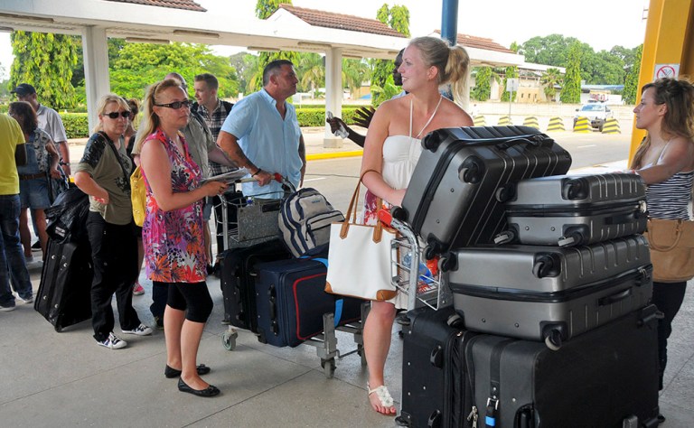 The message, intended to tell Americans if you are not that cool in the U.S., don't be fooled into thinking you are when traveling should people offer you services, came off negatively. (AP Photo)