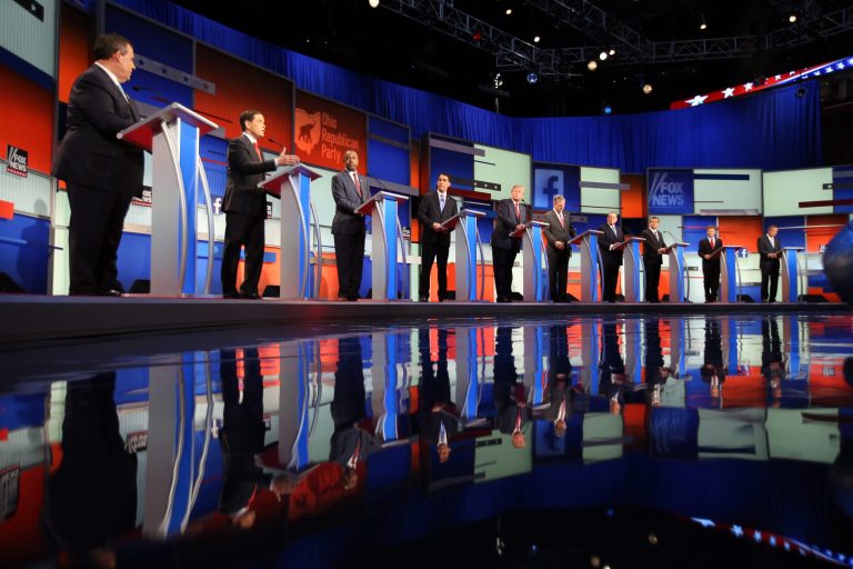 Republican presidential candidates from left, Chris Christie, Marco Rubio, Ben Carson, Scott Walker, Donald Trump, Jeb Bush, Mike Huckabee, Ted Cruz, Rand Paul, and John Kasich take the stage for the first Republican presidential debate at the Quicken Loans Arena Thursday, in Cleveland. (AP Photo/Andrew Harnik)
