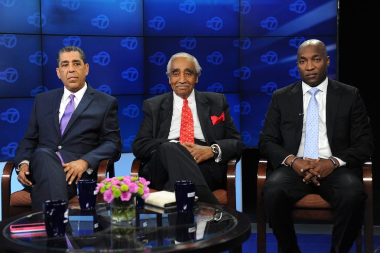 From left, state Senator Adriano Espaillat, Rep. Charles Rangel and Pastor Michael Walrond wait for the start of a debate in the Democratic primary for the 13th Congressional District in New York, on Friday, June 6, 2014 at the WABC-TV studio.  Rangel said Friday that state Sen. Adriano Espaillat is running for Congress because he 