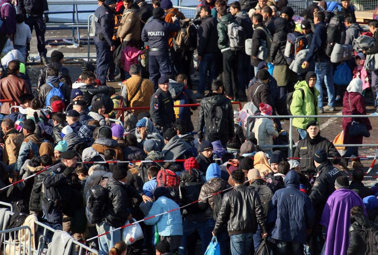 Hundreds of thousands of migrants have flooded to northern Europe in recent months seeking to escape war and poverty and start a new life. (AP Photo/Ronald Zak)