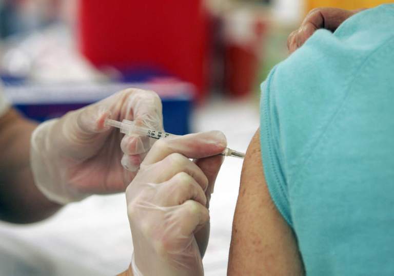The nation's drug companies are planning to supply enough flu vaccines for half the country's population, but it is coming later than planned, in October instead of August. (AP Photo)