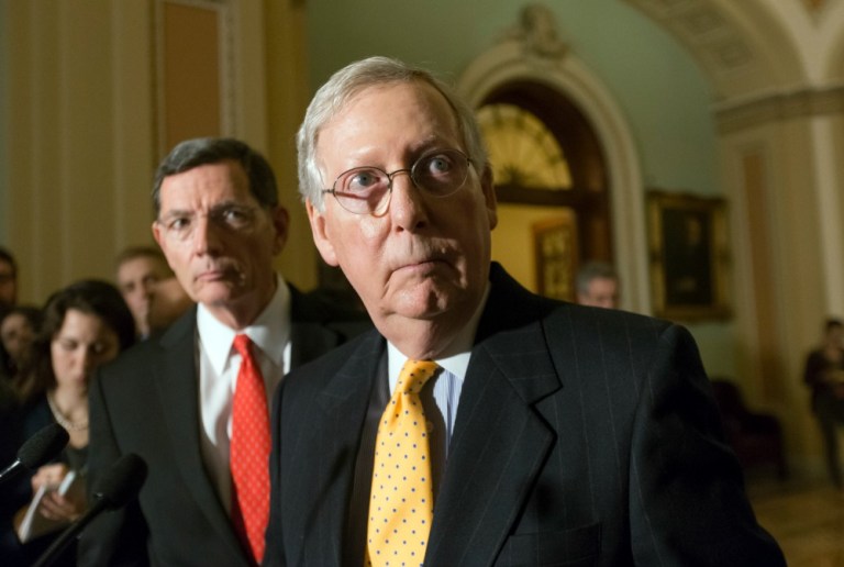 The brief, which was led by Senate Majority Leader Mitch McConnell, R-Ky., charges that Obama's November 2014 executive actions on immigration were illegal. (AP Photo)