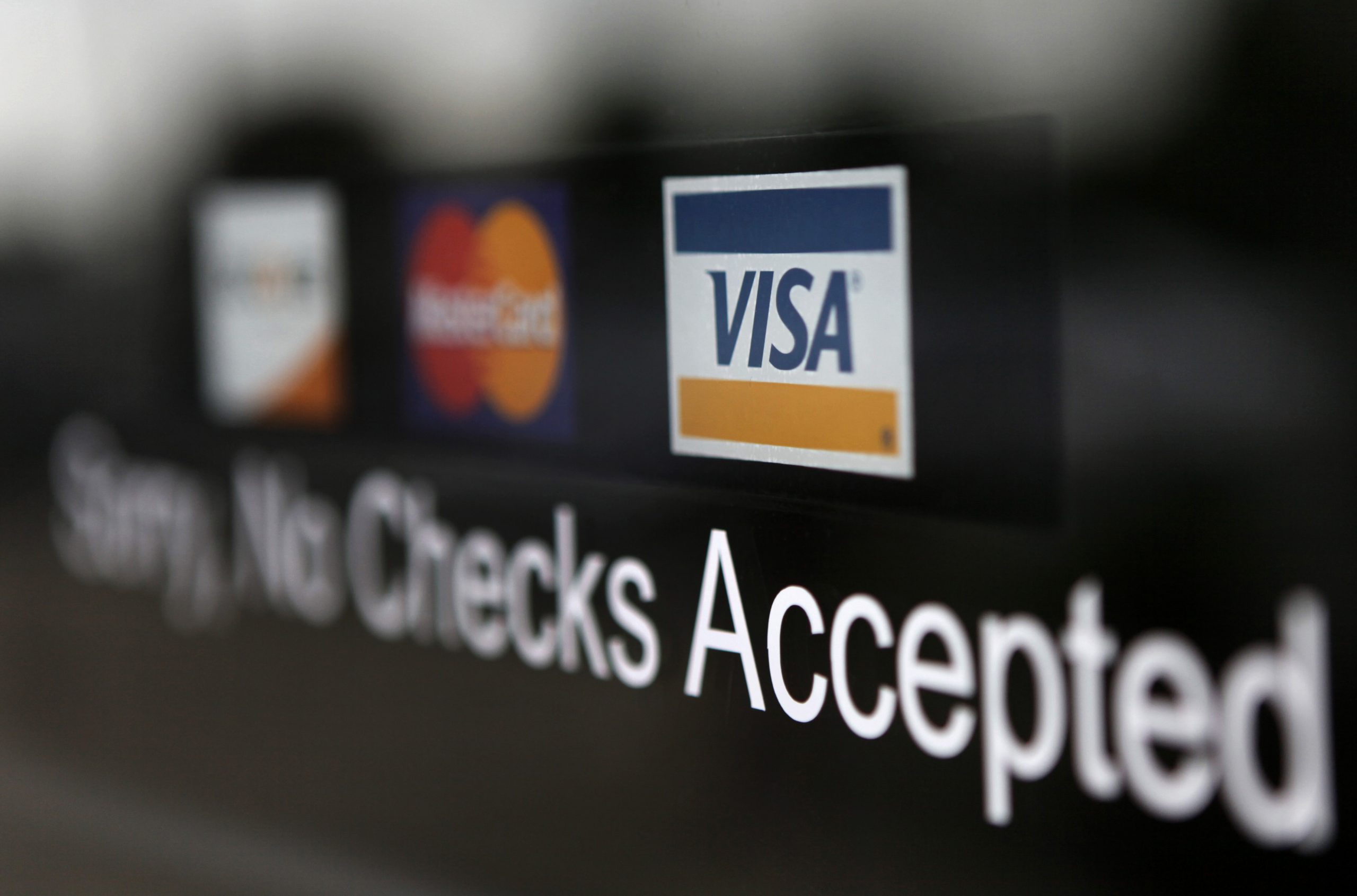 Visa posts higher 3Q profit, revenue