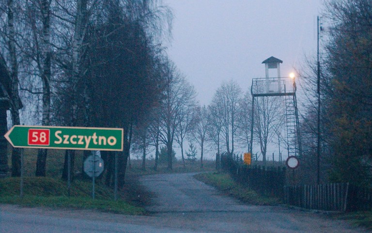 FILE - In this Friday, Dec. 16, 2005 file photo, a watch tower overlooks the area near the Polish intelligence school just outside of Stare Kiejkuty, Poland. The installation had become the focal point of allegations of secret CIA prisons in Poland. Europe's top human rights court ruled Thursday, July 24, 2014, that Poland violated the rights of two terror suspects by allowing the CIA to secretly imprison them on Polish soil from 2002-2003 and facilitating the conditions under which they were subject to torture. ( AP Photo/Czarek Sokolowski, File)
