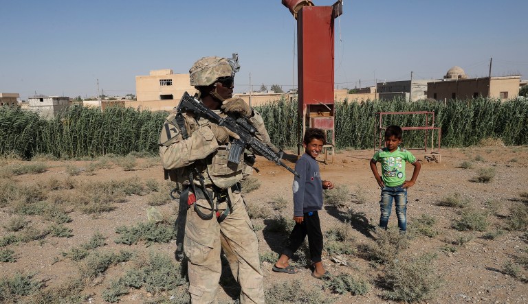 Ultimately, the U.S. ground presence in Syria forces President Bashar Assad and his allies to recognize that they cannot, by themselves, decide what happens next. By staking an American flag in the ground, the U.S. lends credibility and power to those whom Assad would otherwise turn into terrorists. (AP Photo/Hussein Malla)