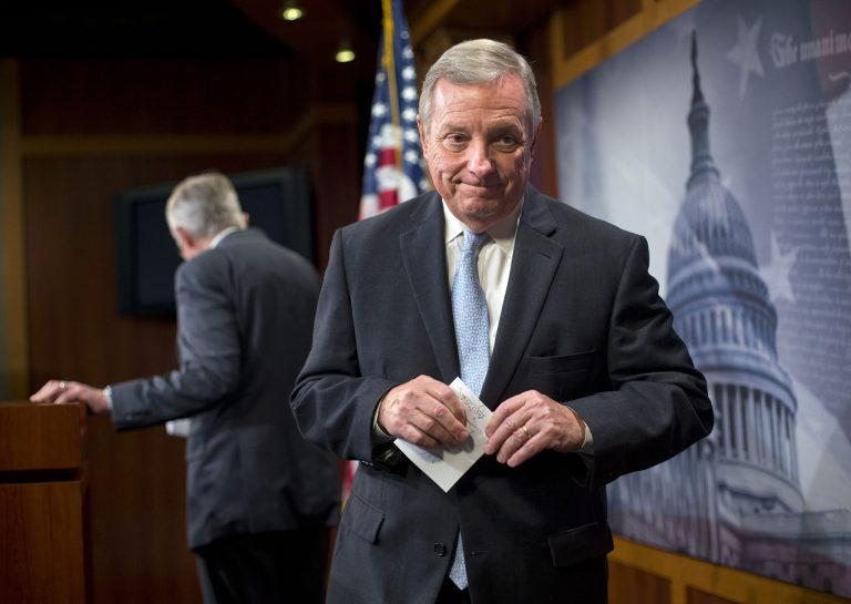 Senate Minority Whip Richard Durbin of Ill., right, and Senate Minority Leader Harry Reid of Nev., left, leave the podium after answering questions for reporters following the Senate vote on the Iran nuclear agreement on Capitol Hill in Washington, Thursday, Sept. 10, 2015. (AP Photo/Pablo Martinez Monsivais)