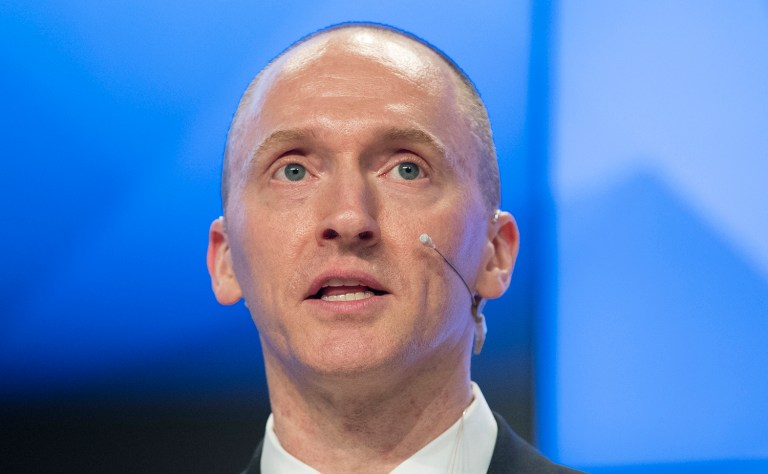 FILE - In this Dec. 12, 2016, file photo, Carter Page, a former foreign policy adviser of U.S. President-elect Donald Trump, speaks at a news conference at RIA Novosti news agency in Moscow, Russia. A published report says the FBI obtained a court order to monitor communications of an adviser to then-candidate Donald Trump last summer. The Washington Post reported April 11, 2017 the application to a special court to monitor Carter Page was part of the investigation into potential links between the Republican's presidential campaign and Russia. The newspaper said its report was based on unnamed law enforcement and other U.S. officials. (AP Photo/Pavel Golovkin, file)
