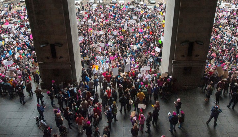 People attend a rally during a Women's March on Sunday. (Stephanie Strasburg/Pittsburgh Post-Gazette via AP)