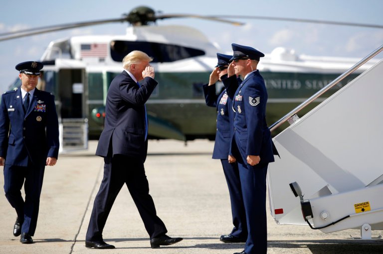 President Donald Trump salutes as he boards Air Force One at Andrews Air Force Base, Md., Friday, June 9, 2017. Trump spent the weekend at Trump National Golf Club in Bedminster, N.J. (AP Photo/Patrick Semansky)