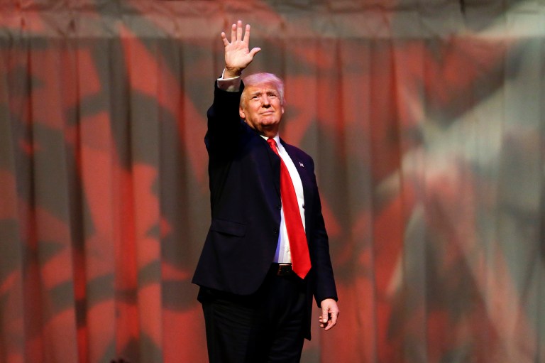 Republican presidential candidate Donald Trump supports government intervention in the economy, particularly when it involves international trade and corporations that want to relocate out of the country, and he opposes entitlement reform. (AP Photo/Michael Conroy)